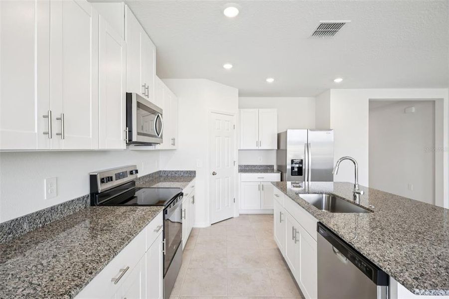Furnished interior view inside a new home in Villamar - Signature Series, Winter Haven (Image 5).