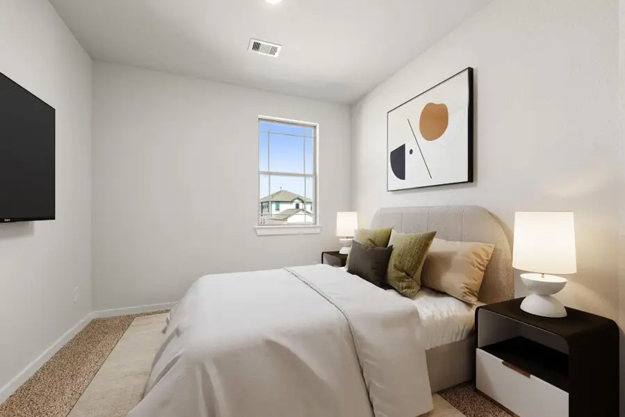 A bright and cozy secondary bedroom featuring soft natural light, neutral tones, and ample wall space, ideal for a guest room or personal retreat. A bright and cozy secondary bedroom featuring soft natural light, neutral tones, and ample wall space, ideal for a guest room or personal retreat.