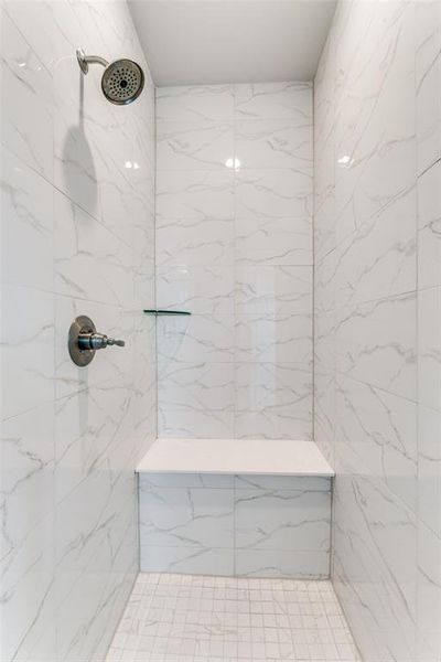 Bathroom featuring tiled shower