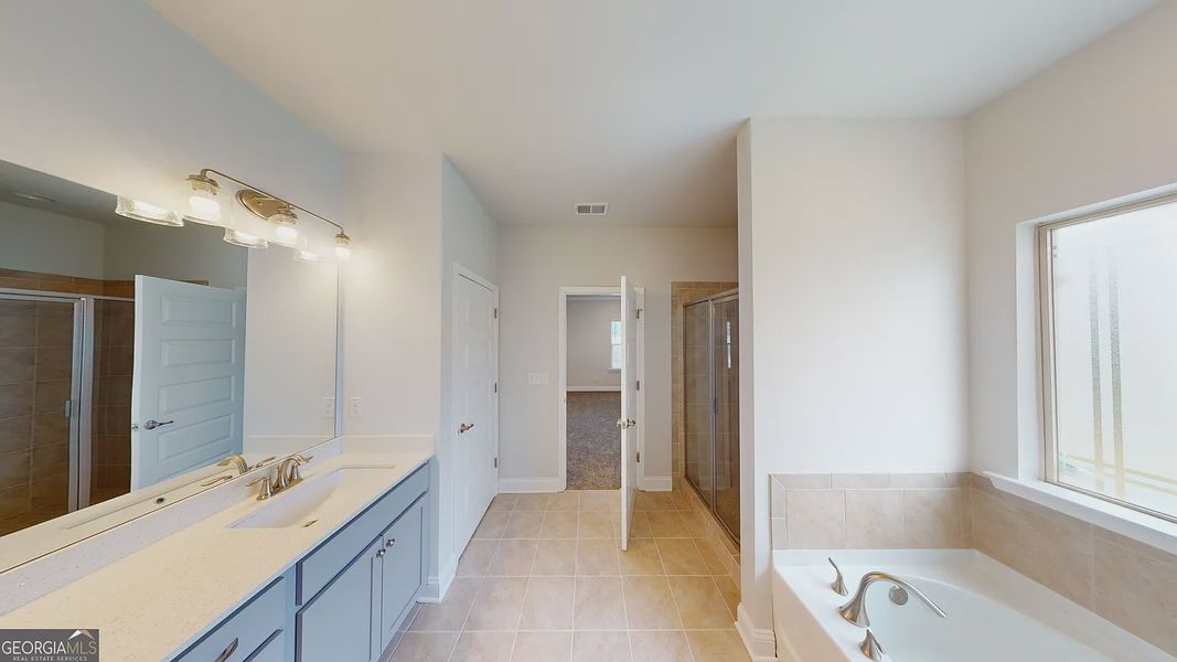 Furnished interior view inside a new home in Holliday Pass, Griffin (Image 11).