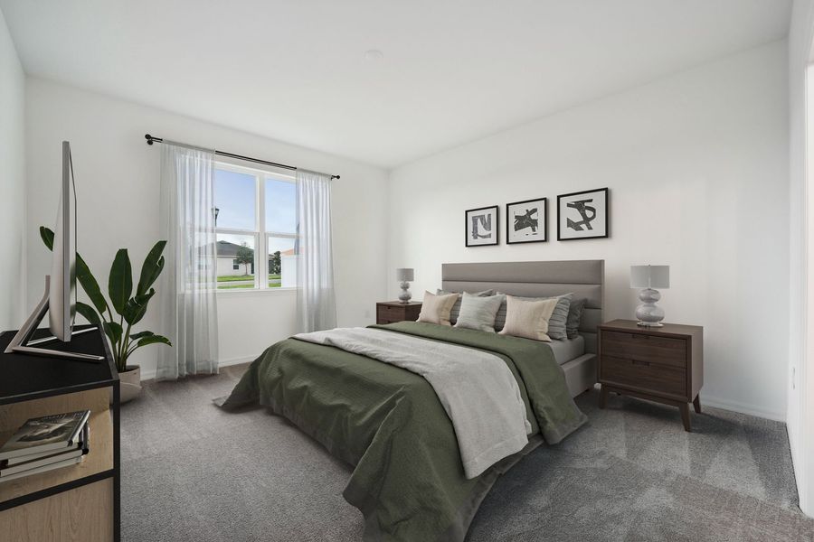 Primary Bedroom at The Seaton at Sunset Lakes Estates