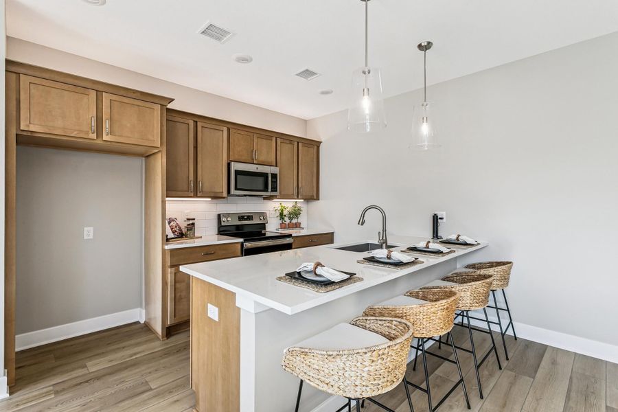 Representative furnished interior of a home built from the Cassia by Perfection Builders in Heritage Commons, Andover (Image 6).