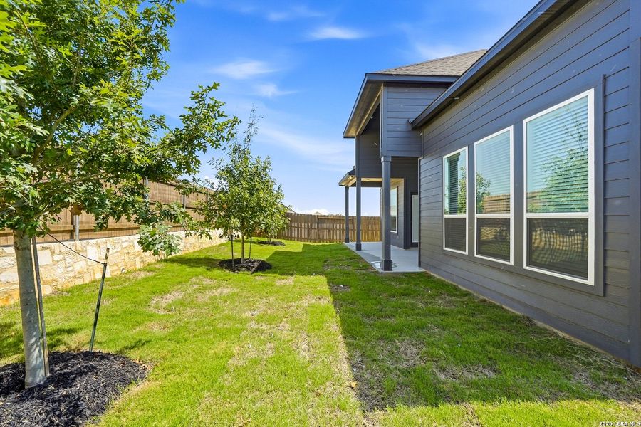 Exterior details and patio area of a home in Prominence Urban, San Antonio (Image 4).
