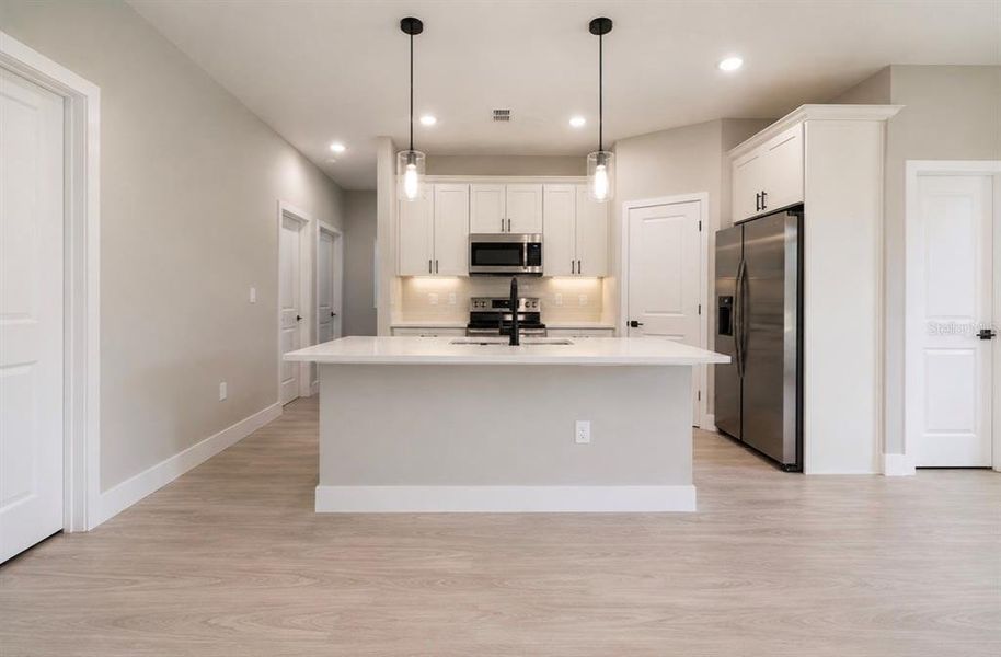 Furnished interior view inside a new home in , Poinciana (Image 5). Furnished interior view inside a new home in , Poinciana (Image 5).