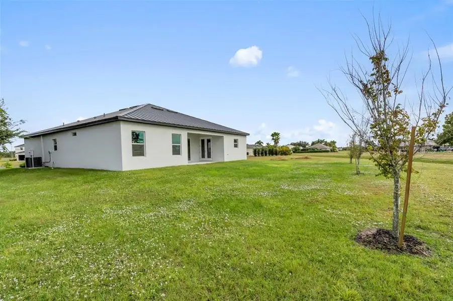 Exterior details and patio area of a home in , Punta Gorda (Image 3).
