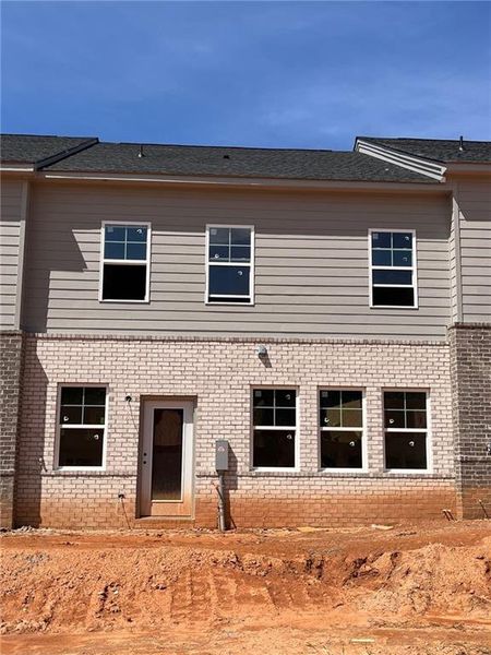 Front exterior of a new home in Governors Parc, Kennesaw, GA, highlighting curb appeal (Image 2). Front exterior of a new home in Governors Parc, Kennesaw, GA, highlighting curb appeal (Image 2).