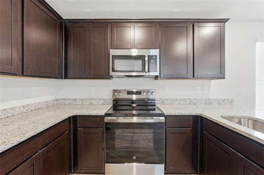 Furnished interior view inside a new home in The Enclave at Stonewall Station, Union City (Image 7).
