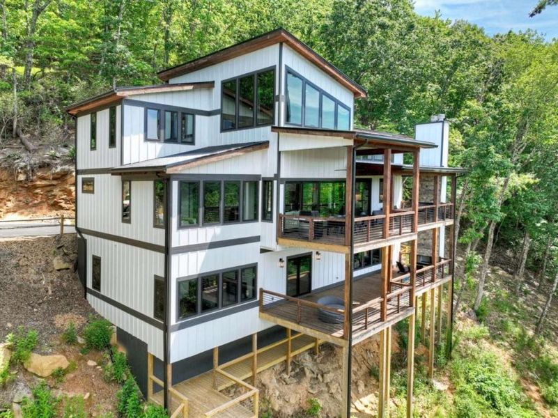 Front exterior of a new home in , Epworth, GA, highlighting curb appeal (Image 28).