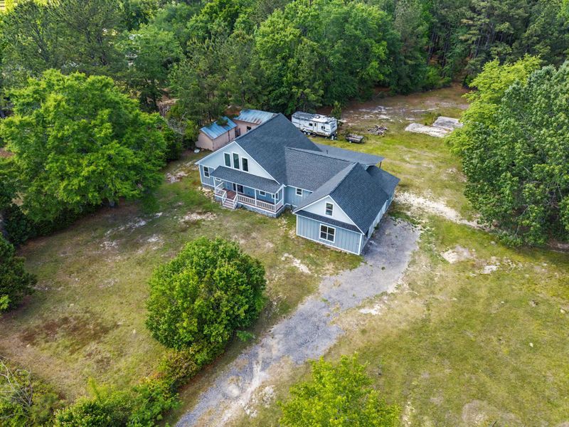 Front exterior of a new home in , Moncks Corner, SC, highlighting curb appeal (Image 21).