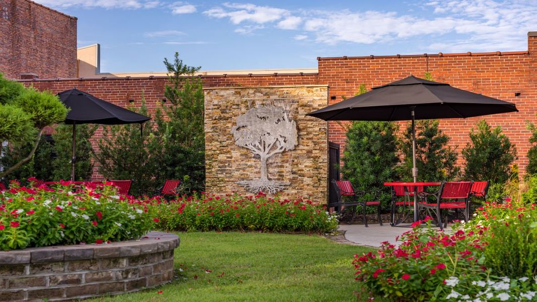 Front exterior of a new home in Heritage Crossing, Conway, SC, highlighting curb appeal (Image 22).