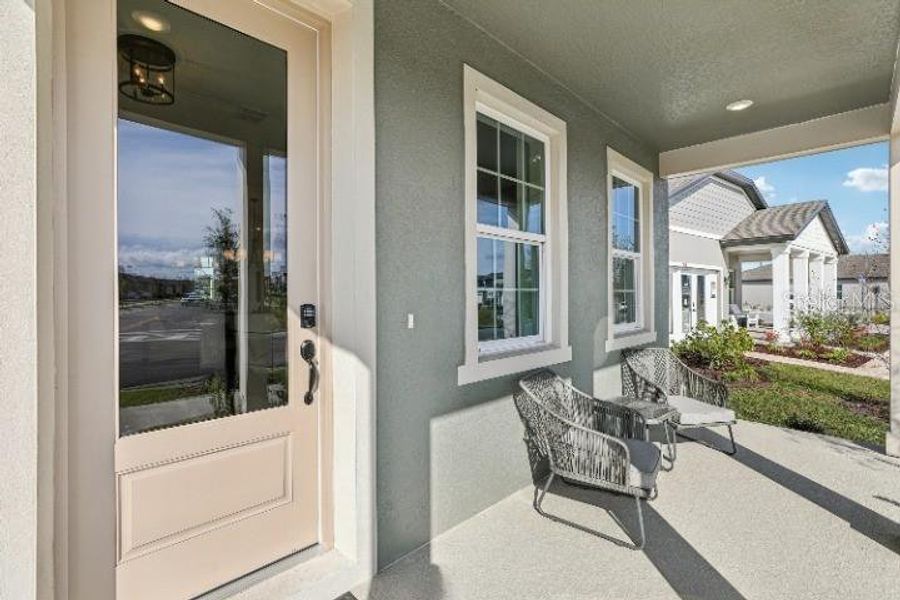 Exterior details and patio area of a home in Hawks Run, Kissimmee (Image 24).