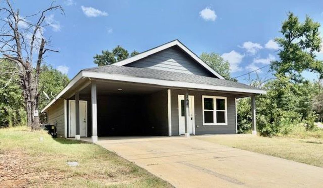 Front exterior of a new home in , Mabank, TX, highlighting curb appeal (Image 19). Front exterior of a new home in , Mabank, TX, highlighting curb appeal (Image 19).