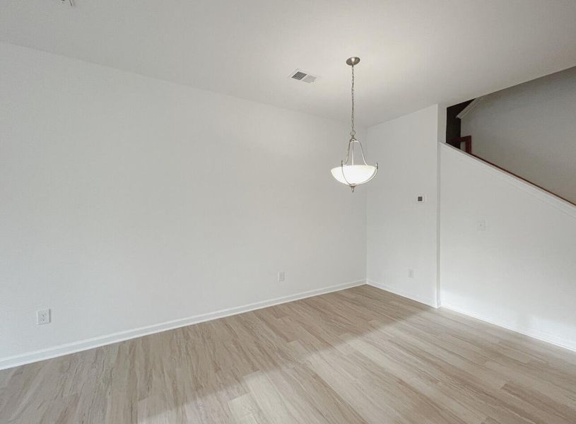 Spacious, unfurnished interior of a new home in East Main Townes, Spartanburg (Image 13).