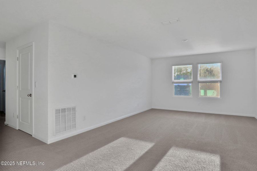 Spacious, unfurnished interior of a new home in Cordova Palms, St. Augustine (Image 17).