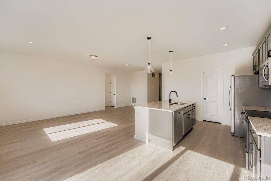 Images not from actual home, but are from same floor plan.