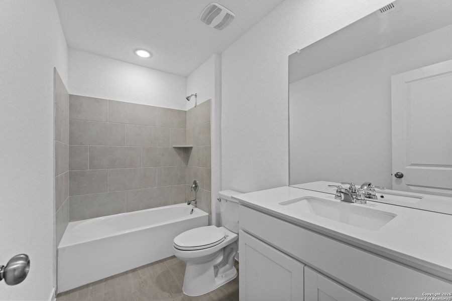 Furnished interior view inside a new home in Voss Farms, New Braunfels (Image 11).