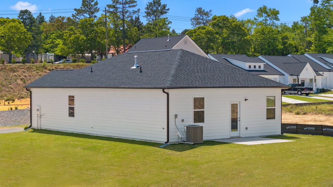 Exterior details and patio area of a home in Byrd Village, Graniteville (Image 2).