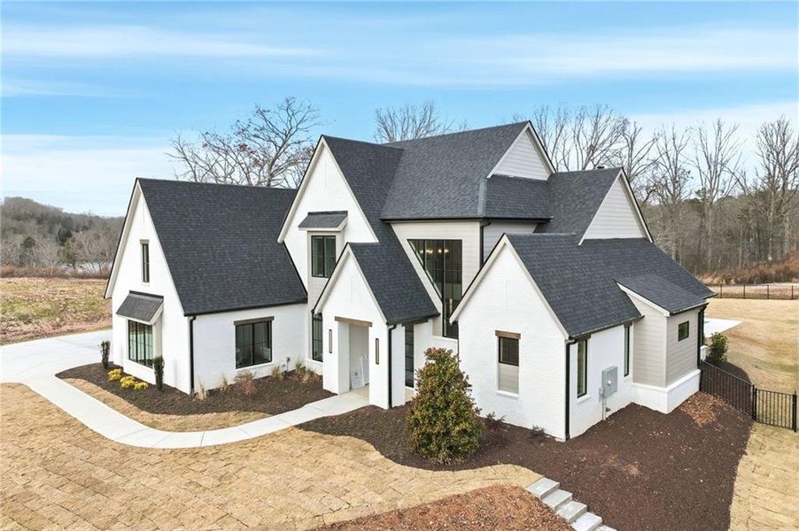 Front exterior of a new home in , Gainesville, GA, highlighting curb appeal (Image 1). Front exterior of a new home in , Gainesville, GA, highlighting curb appeal (Image 1).