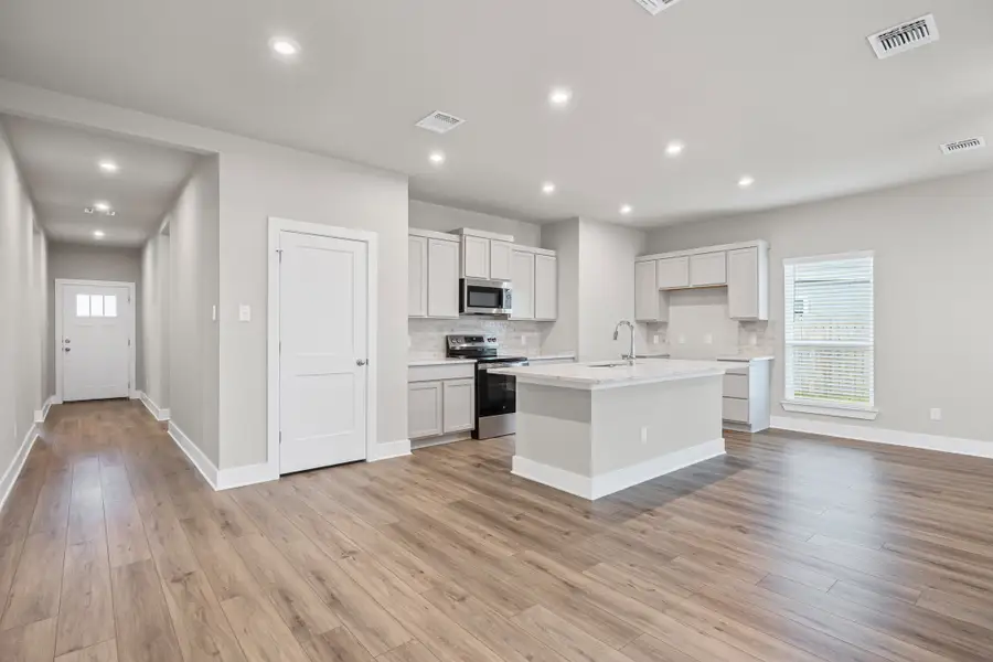 Representative furnished interior of a home built from the Caden by Omega Builders in North Point, Temple (Image 4).