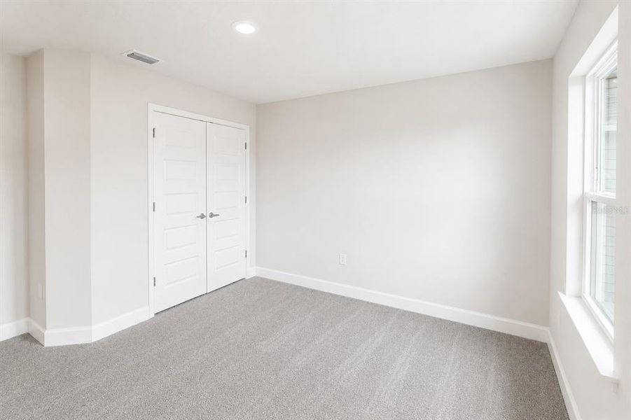 Spacious, unfurnished interior of a new home in Harmony Central, St. Cloud (Image 12).