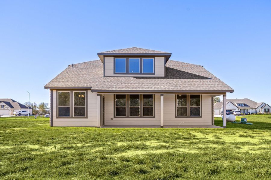 Exterior details and patio area of a home in Southfork Ranch, Sealy (Image 25).