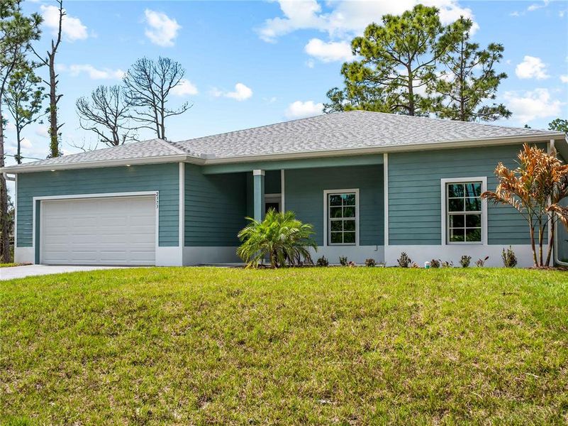 Exterior details and patio area of a home in , North Port (Image 33).