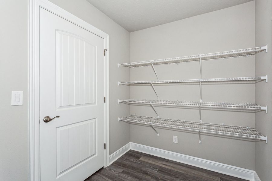 Representative furnished interior of a home built from the The Sapphire by Herbst Homes in Clear Water Landing, Milton (Image 59).