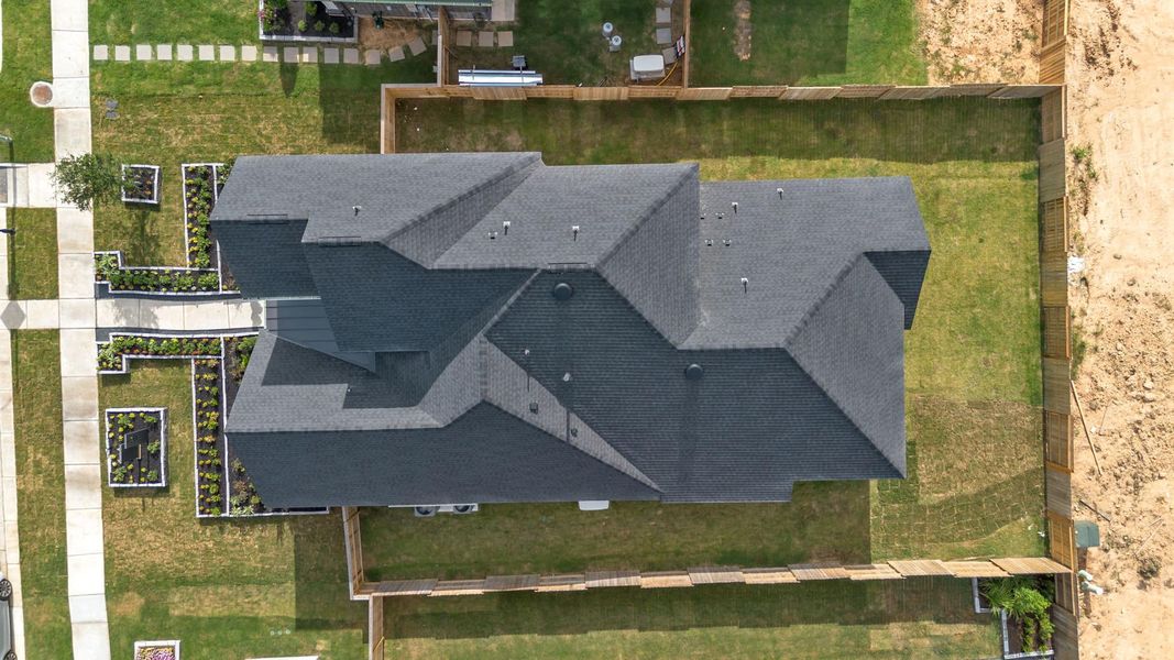 Representative exterior photo of a completed home built from the Cayman 50′ Lot by Chesmar Homes in Meridiana, Manvel, TX (Image 27). Representative exterior photo of a completed home built from the Cayman 50′ Lot by Chesmar Homes in Meridiana, Manvel, TX (Image 27).