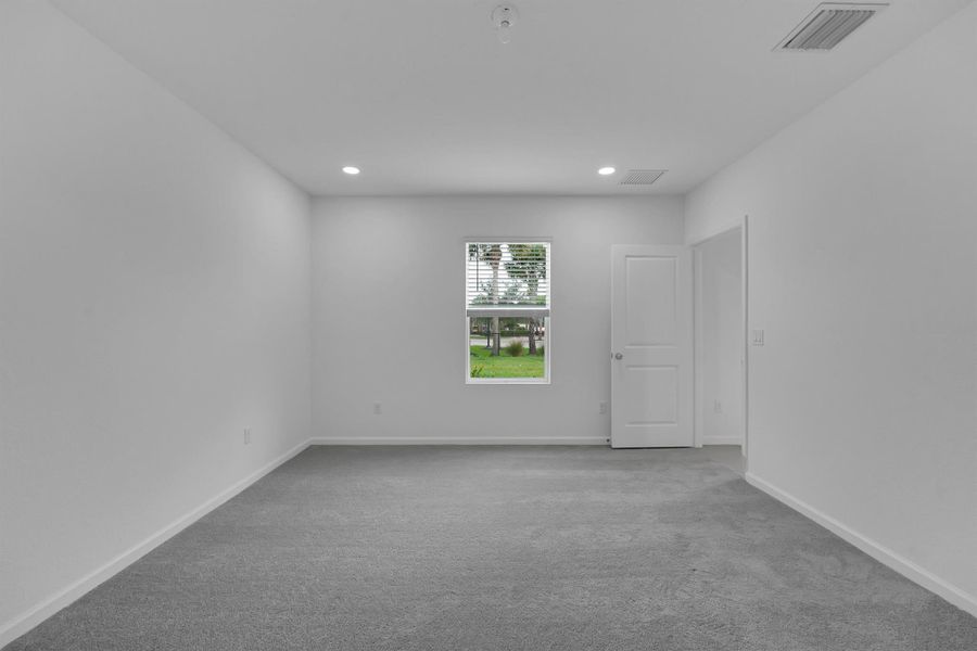 Spacious, unfurnished interior of a new home in Bent Creek: The Meadows Collection, Fort Pierce (Image 24).