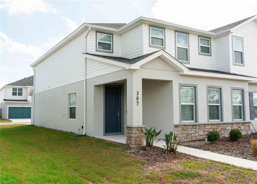 Front exterior of a new home in , St. Cloud, FL, highlighting curb appeal (Image 2). Front exterior of a new home in , St. Cloud, FL, highlighting curb appeal (Image 2).