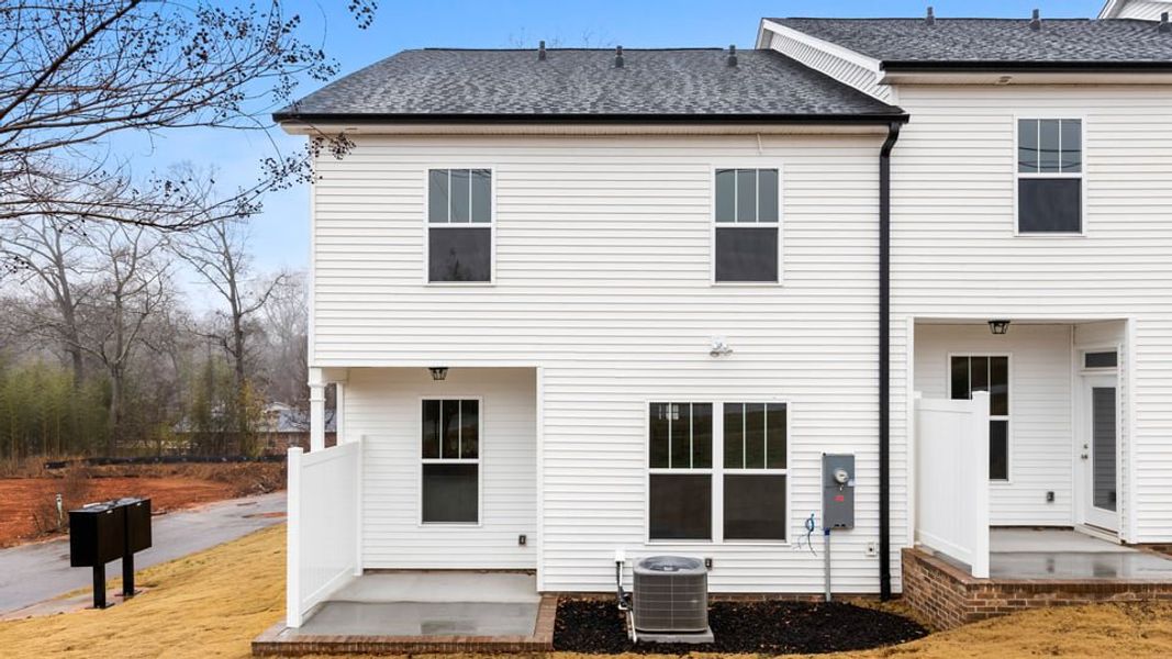 Exterior details and patio area of a home in Pearson Road Townhomes, Easley (Image 3). Exterior details and patio area of a home in Pearson Road Townhomes, Easley (Image 3).