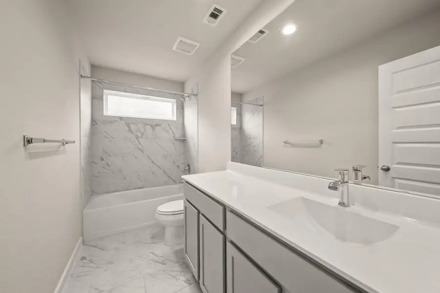 Furnished interior view inside a new home in Barton Creek Ranch, Conroe (Image 7).