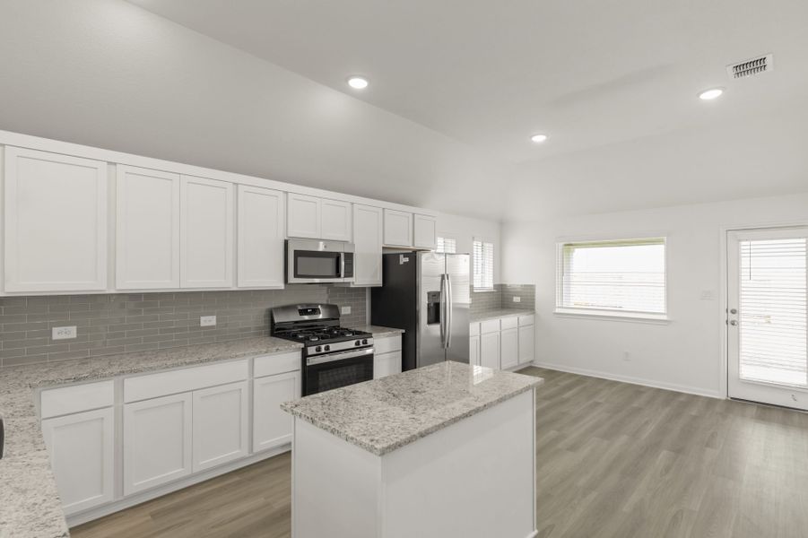 Furnished interior view inside a new home in Village at Three Oaks, Seguin (Image 10).