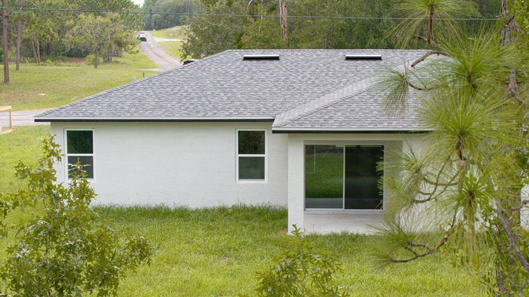 Exterior details and patio area of a home in , Citrus Springs (Image 19).