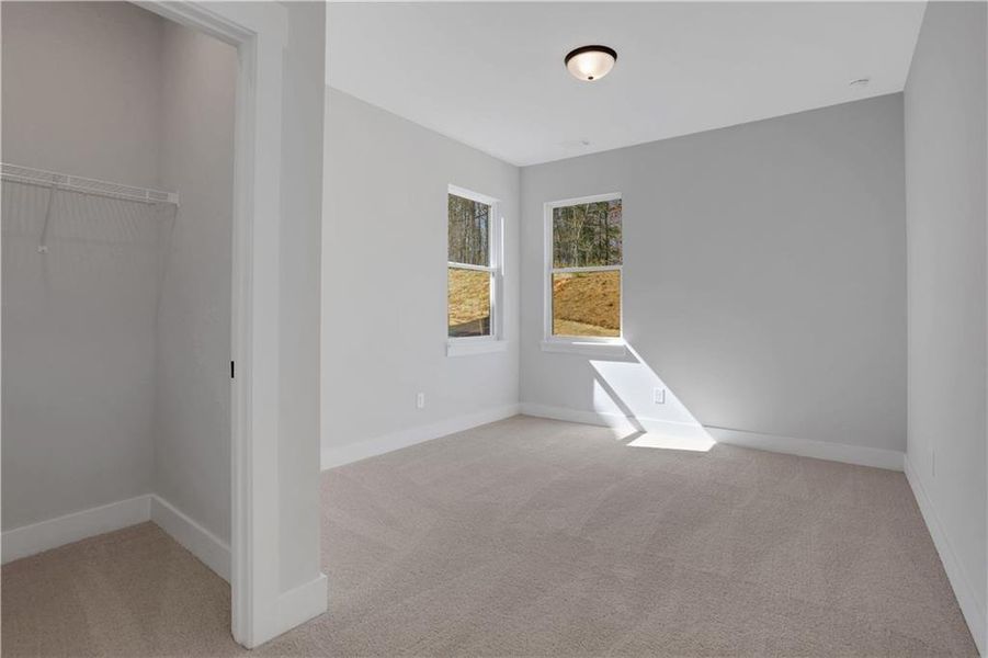 Spacious, unfurnished interior of a new home in Cambridge, Flowery Branch (Image 40).