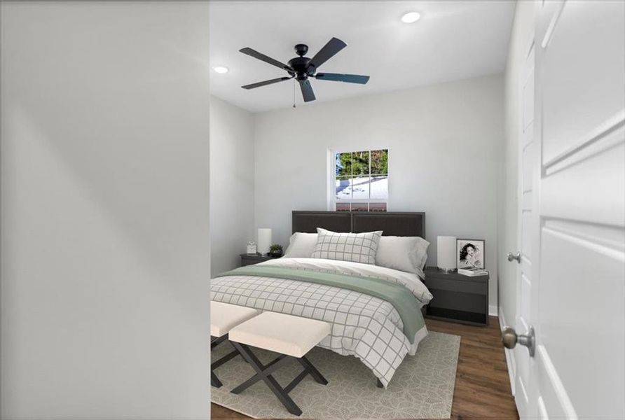 Bedroom with dark wood-type flooring, recessed lighting, and a ceiling fan