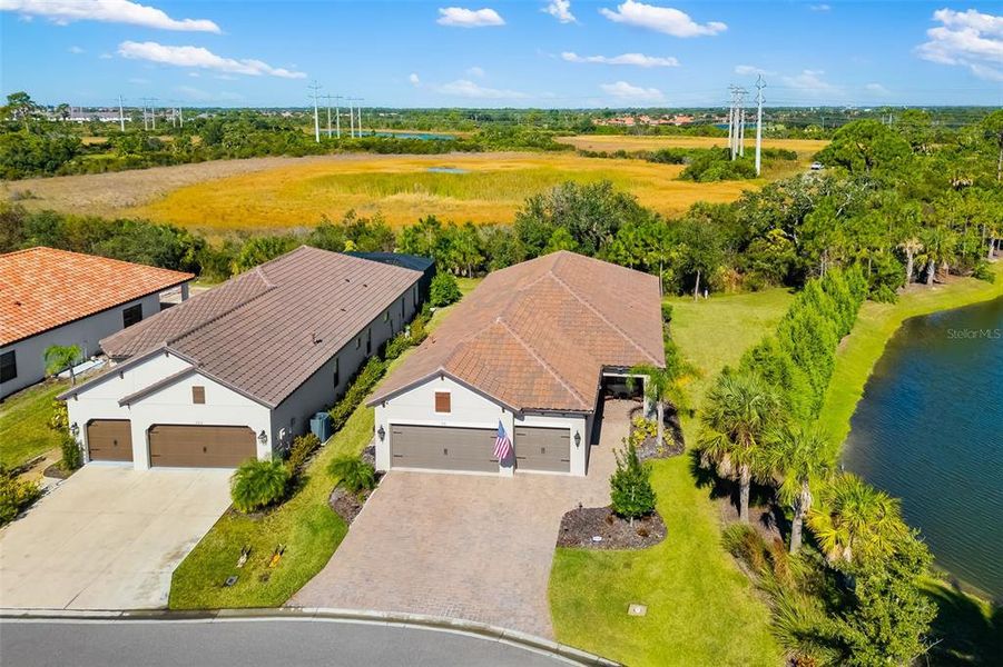 Front exterior of a new home in , Nokomis, FL, highlighting curb appeal (Image 30).