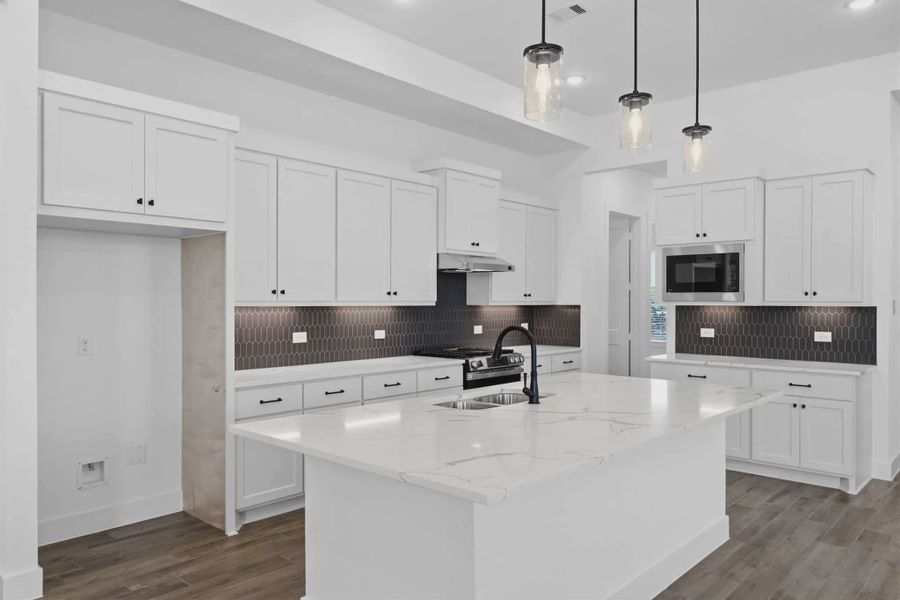 Representative furnished interior of a home built from the Sorenstam by Chesmar Homes in Riceland Alley Loads, Mont Belvieu (Image 12).