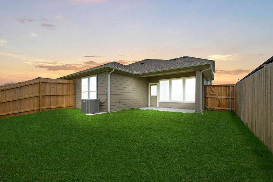 Rear of Home and Private Backyard