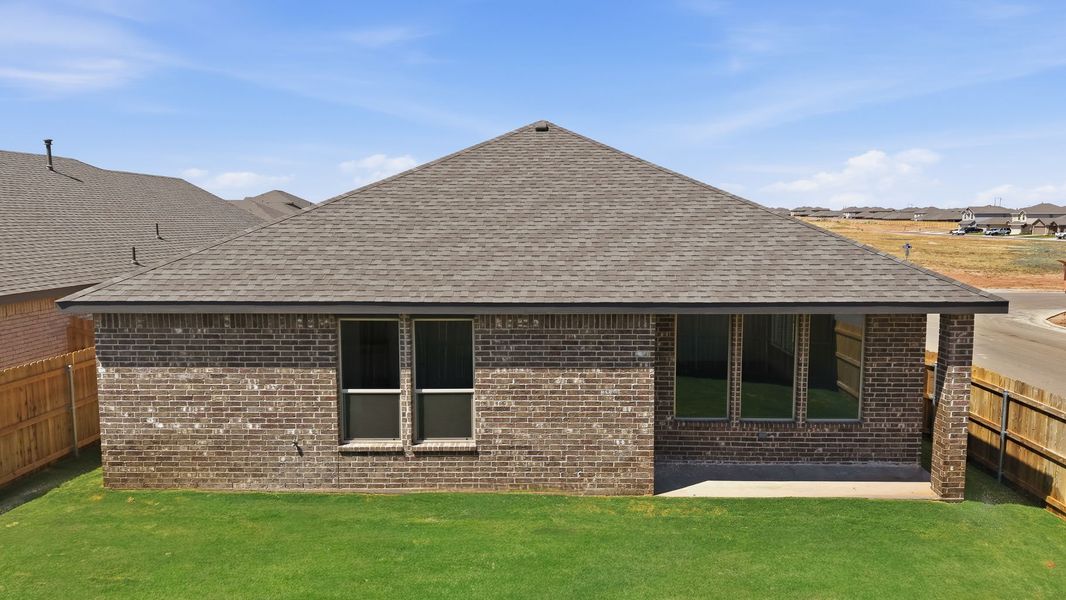 Exterior details and patio area of a home in Overlook West, Wolfforth (Image 3).