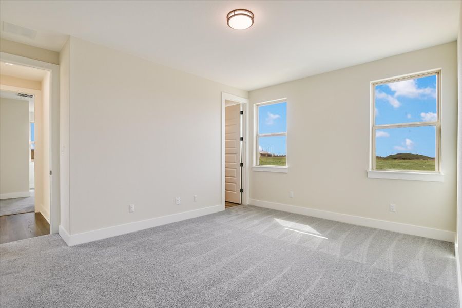 Representative unfurnished interior of a home built from the Avalon by Giddens Homes in Scofield Farms Estates, Georgetown (Image 219).