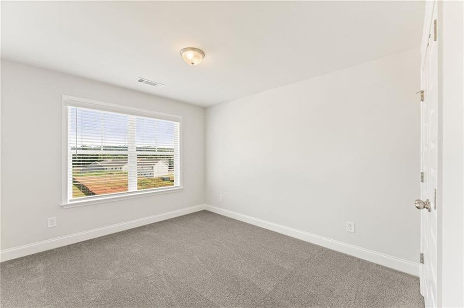 Spacious, unfurnished interior of a new home in Clark Farms, Flowery Branch (Image 29).