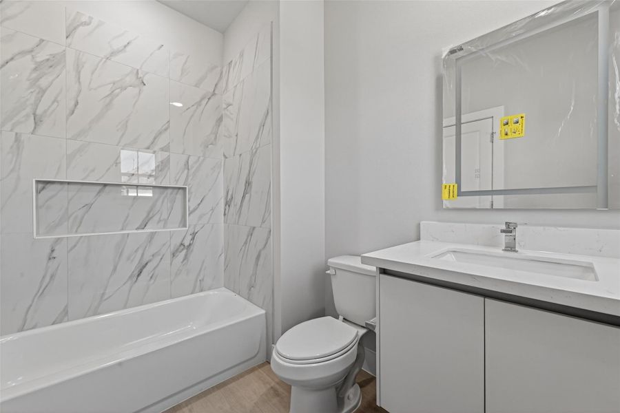 Furnished interior view inside a new home in Metro Village, Houston (Image 8).