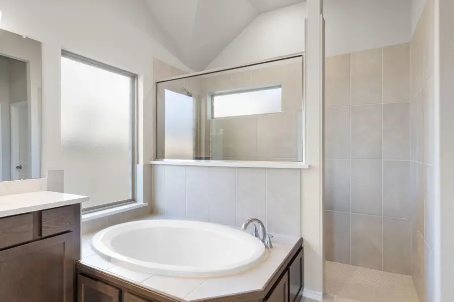 Furnished interior view inside a new home in Dunham Pointe 50', Cypress (Image 6).