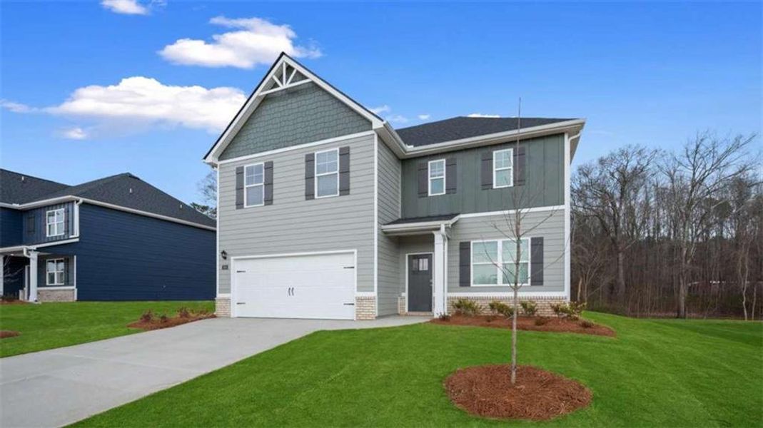 Front exterior of a new home in Jackson Landing, Jefferson, GA, highlighting curb appeal (Image 2). Front exterior of a new home in Jackson Landing, Jefferson, GA, highlighting curb appeal (Image 2).