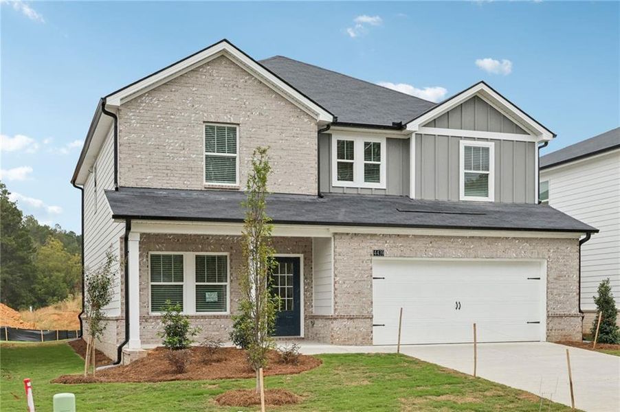Front exterior of a new home in Westmont Preserve, Powder Springs, GA, highlighting curb appeal (Image 25).