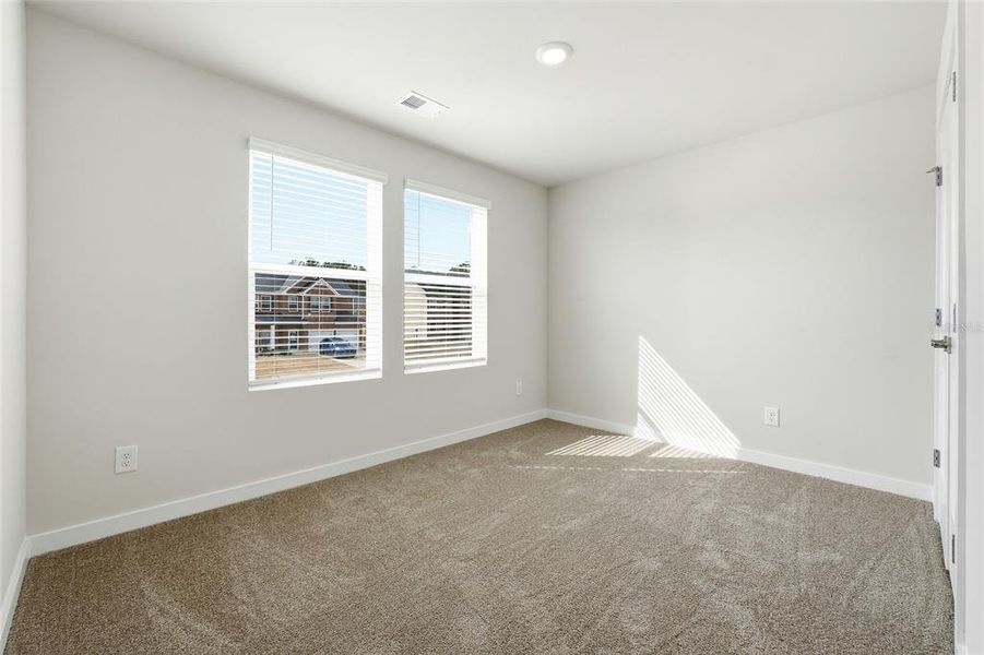Spacious, unfurnished interior of a new home in Fern Dale, Fairburn (Image 28).