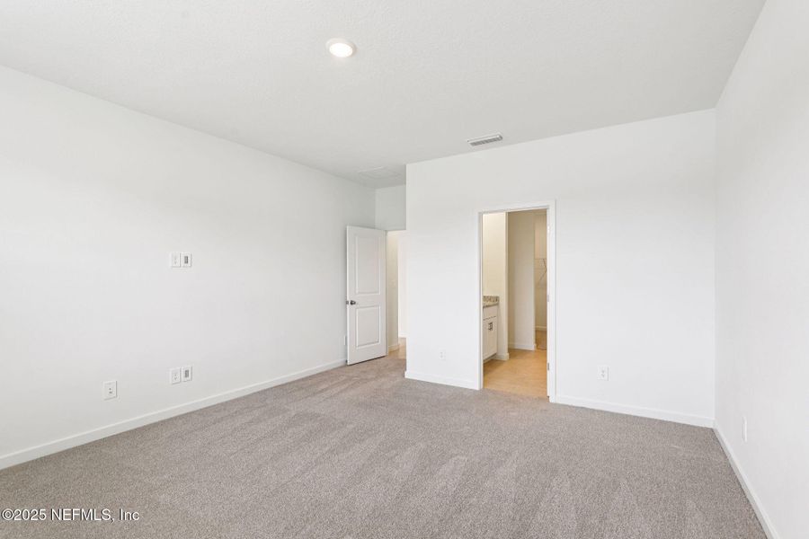 Spacious, unfurnished interior of a new home in Lakes at Bella Lago - Signature Series, Green Cove Springs (Image 12).