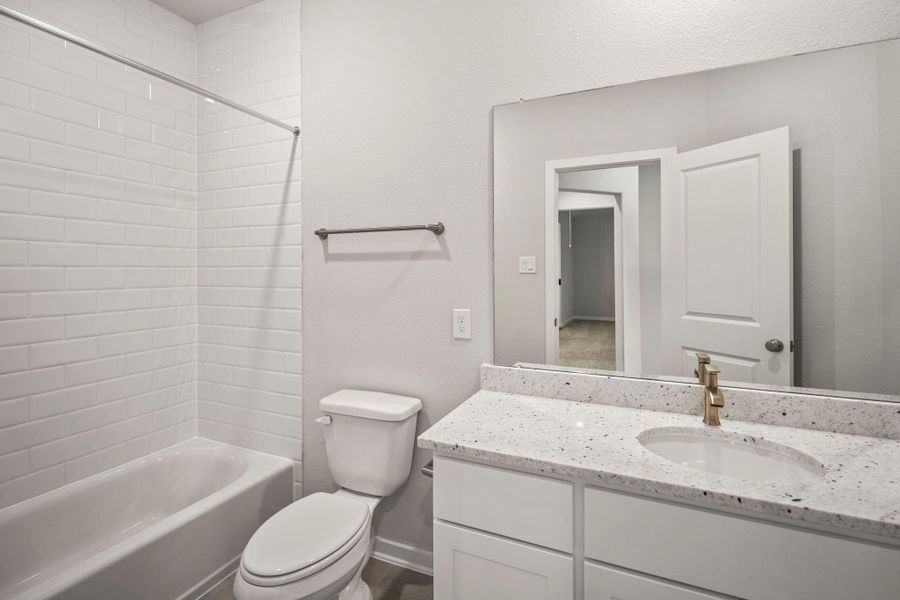 Furnished interior view inside a new home in ARTAVIA 55' Lots, Conroe (Image 18).