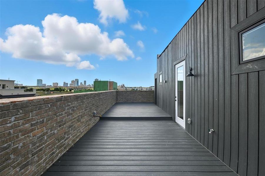 Wooden terrace with a skyline view